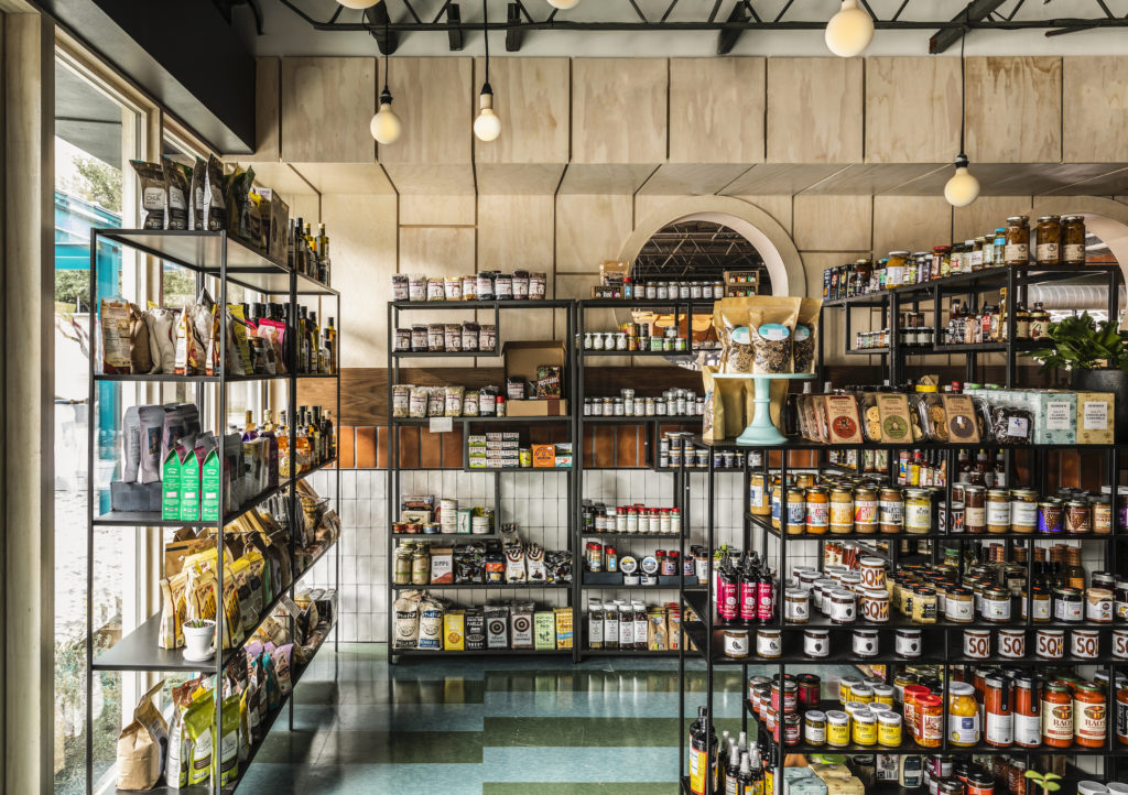 The grocery side of the concept includes small, artisanal foodie staples across the country including specialty spices and sauces.  ((Photo by Julie Soefer)