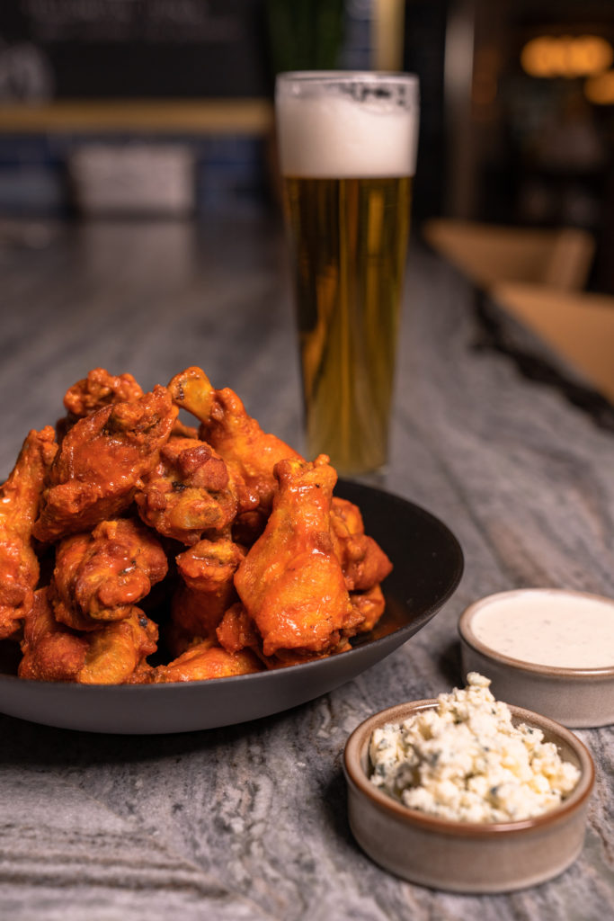 Bludorn chicken wings on the Super Bowl  to-go menu, sales of which benefit the Southern Smoke Foundation. (Photo by Michael Anthony)