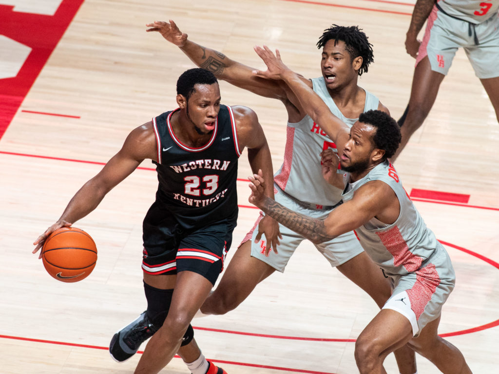 NBA prospect Charles Bassey found himself hounded by Houston's interior defense. (Photo by F. Carter Smith)
