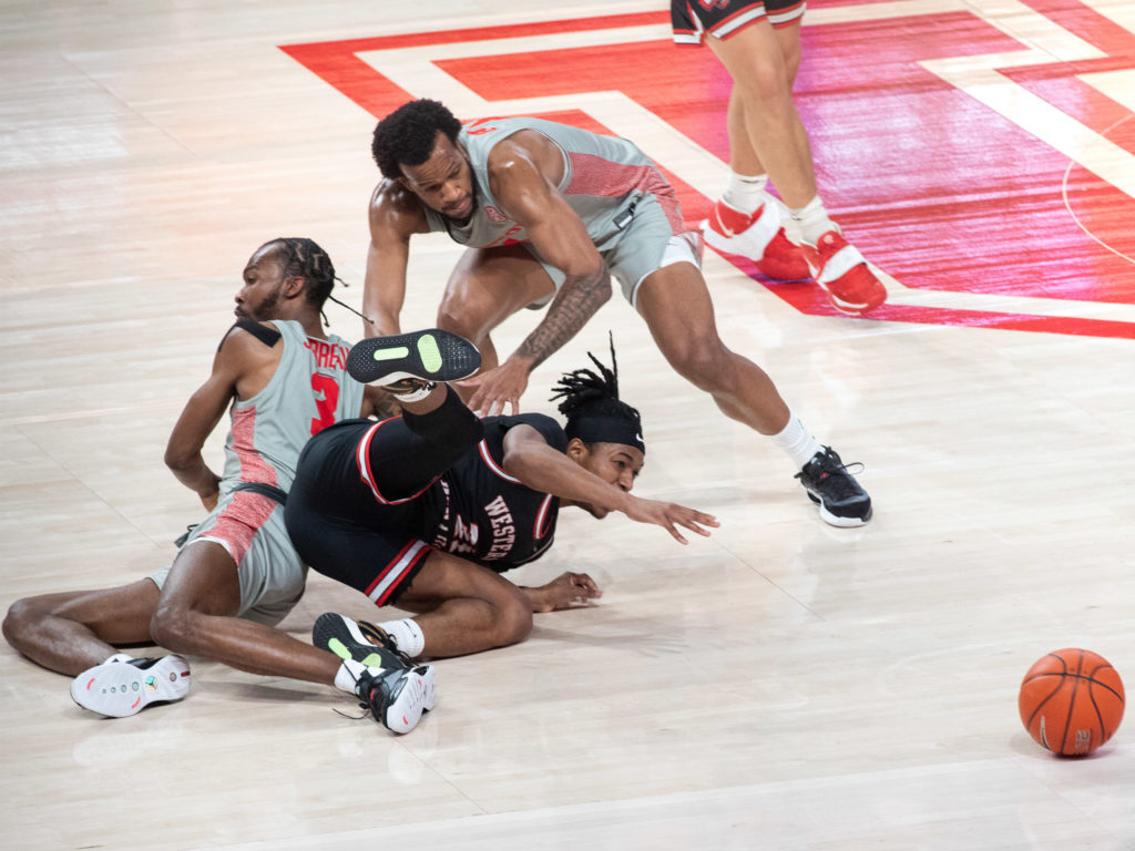 University of Houston's basketball program is known for its relentless, all out play. (Photo by F. Carter Smith)