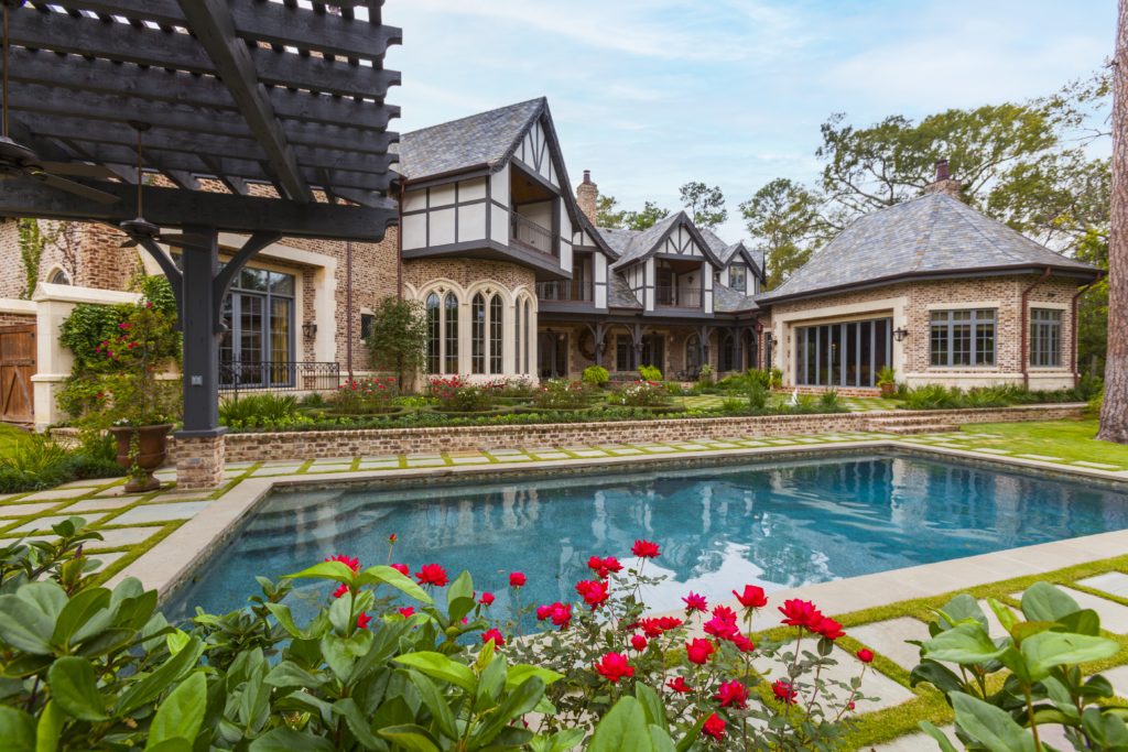 A salt water pool is one of the numerous amenities of the mansion at 3996 Inverness in River Oaks, listed with Douglas Elliman. (Photo by Julie Soefer)