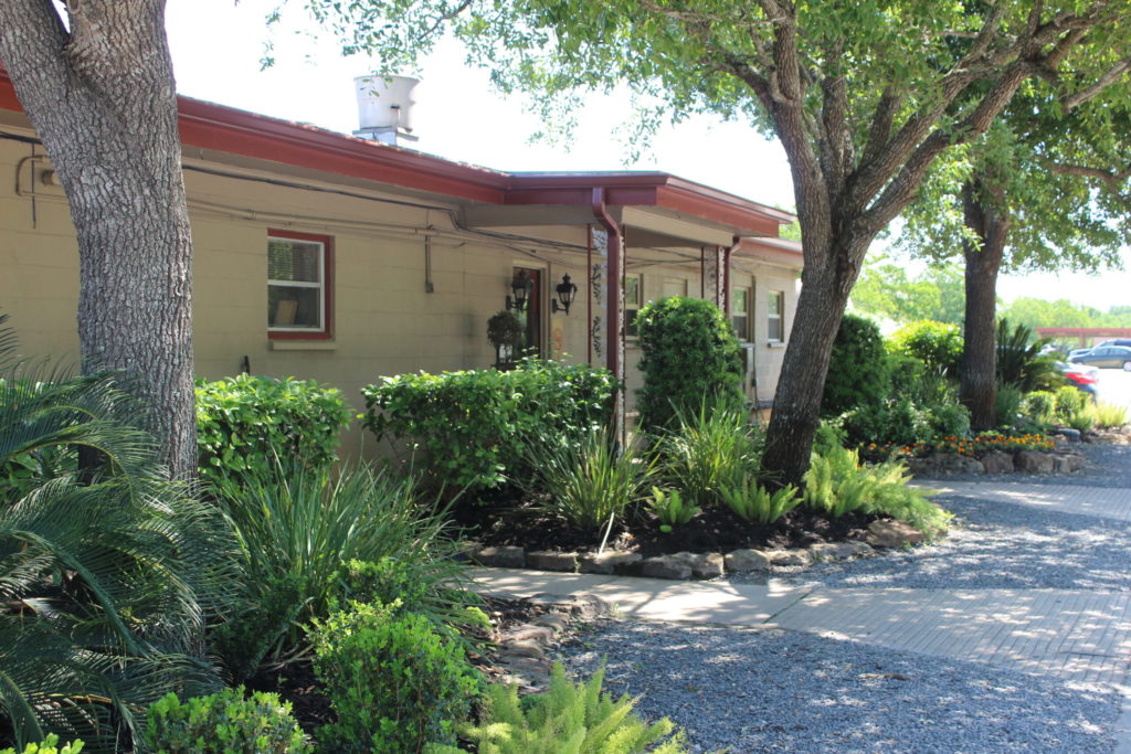 The Clubhouse at Greater Houston Sports Club stands at the center of its shooting courses.