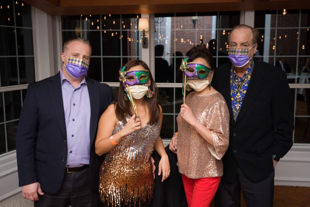 Marcus Phillips, Blonde Suico, Maria & Richard Butler at The Houstonian Mardi Gras bash held in all three dining rooms of the historic Manor House. (Photo by Daniel Ortiz)