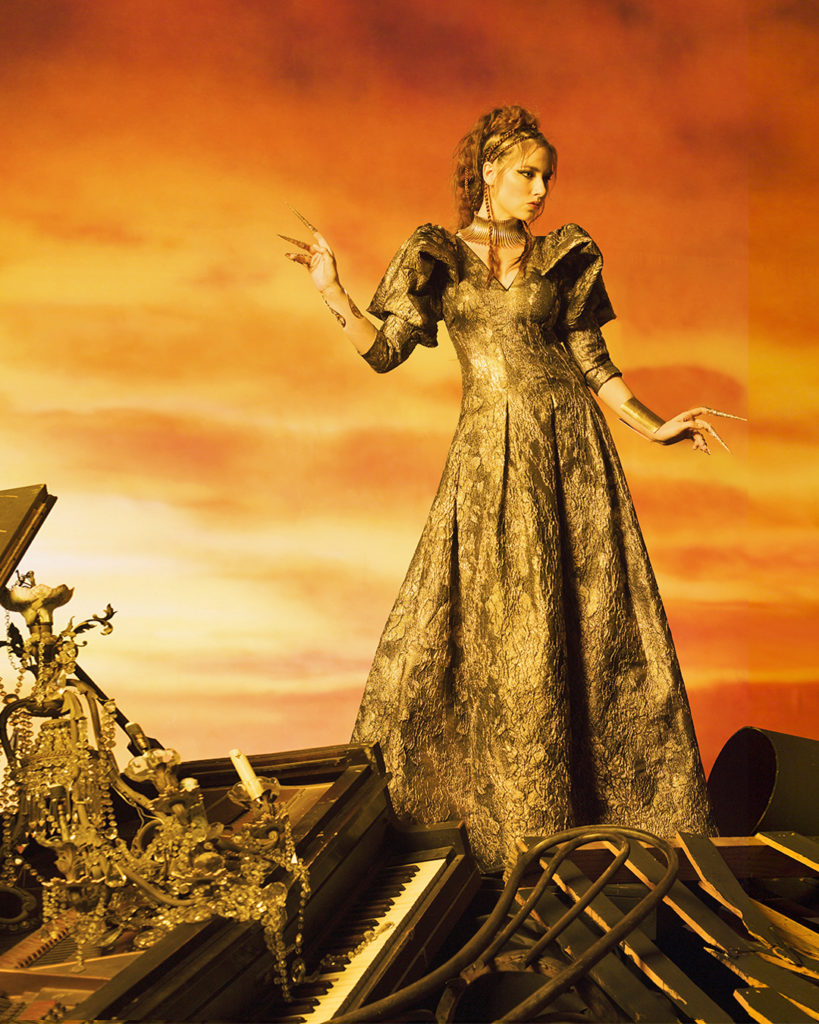 Tadashi Shoji bronze armor motif jacquard ball gown with structured elbow-length sleeves. (Photo courtesy of Tadashi Shoji)