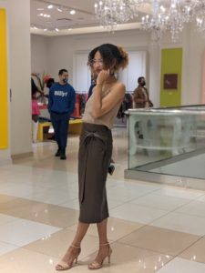 India Lovejoy, founder of Black Buddha Creative Agency, the producer of “Collect It For the Culture III,” pauses for just a moment to take pics for press on opening night. (Photo by Crystal Correa)