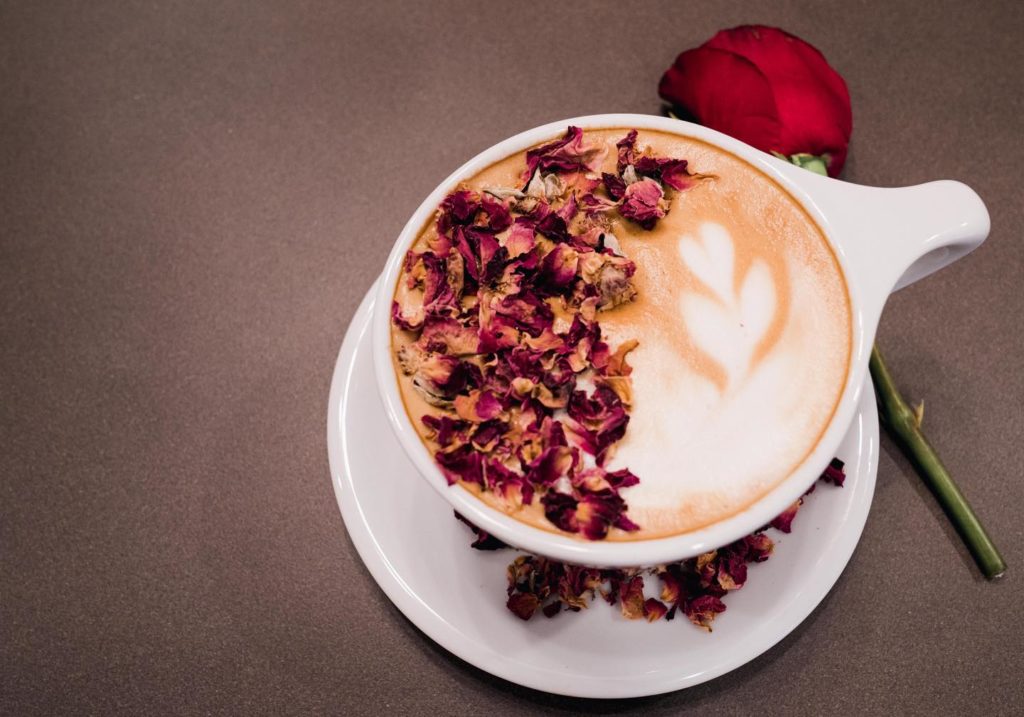 Pax & Beneficia Coffee – Rose latte with rose syrup garnished with rose petals