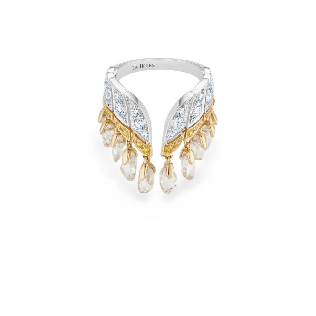 A double fringe of white rough diamonds is suspended from rows of round brilliant white and yellow pavé  diamonds in the Namib Wonder cuff bracelet from De Beers' Reflections on Nature high jewelry collection. (Photo courtesy of De Beers Jewellery)