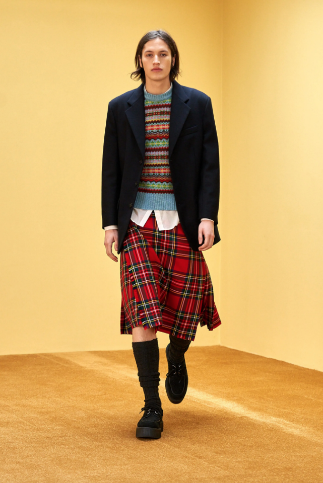Molly Goddard menswear look includes tartan kilt skirt, Fair Isle sweater, navy blazer. (Photo courtesy of Molly Goddard)
