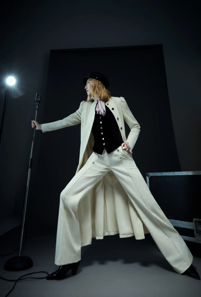 Temperley London gets rockin' with a 70's style long coat and flared trousers. (Photo courtesy of Temperley London)