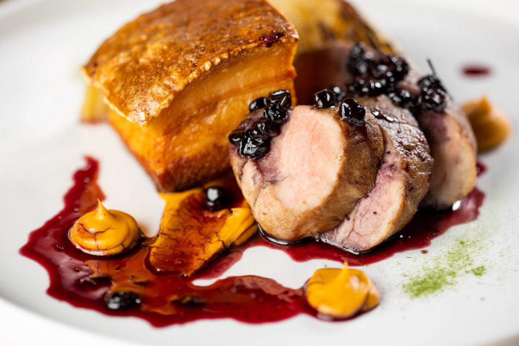 The Heritage Pork is a must-try dish at Saint Ann Restaurant. (Photo by Kathy Tran)