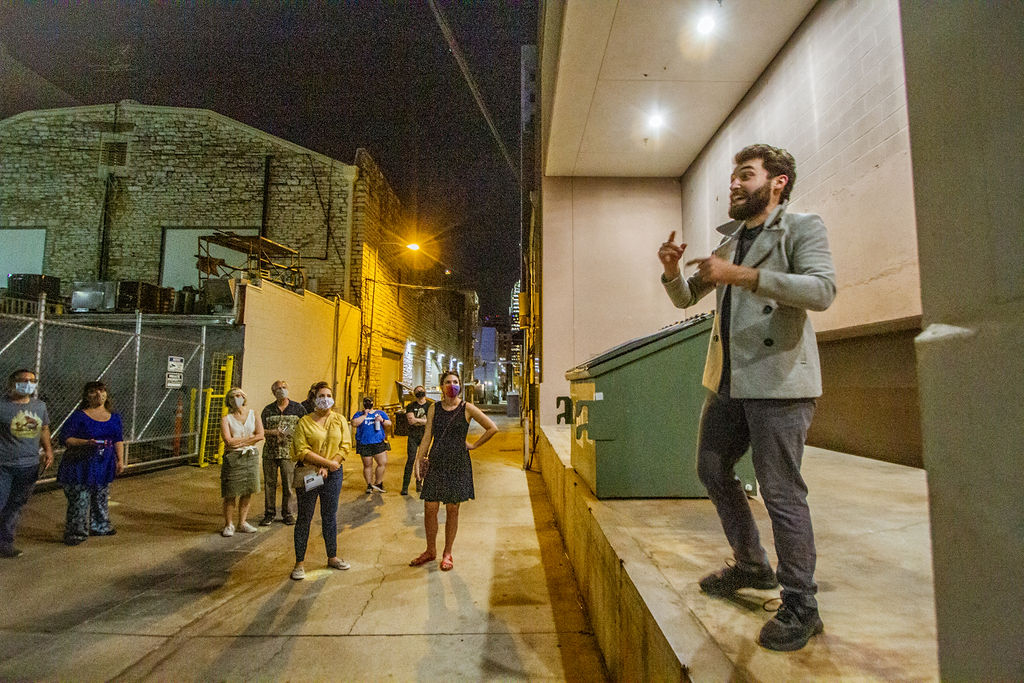 A meeting with a witness in an Austin back alley. 