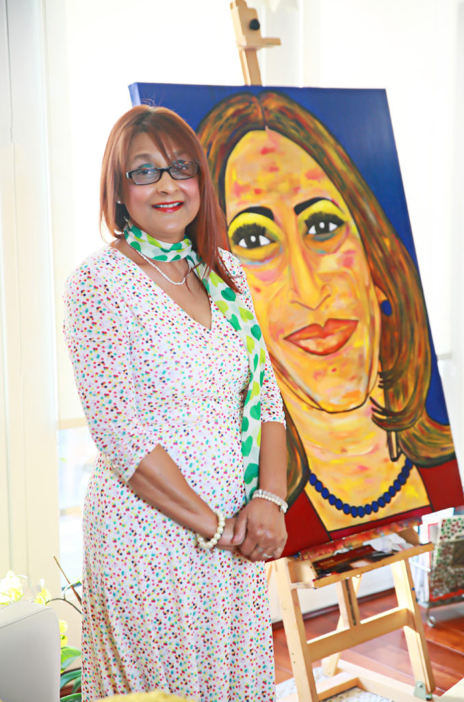 Artist Linda Simien Kelly’s portrait, “The Identity of Change," characterizes Harris as a strong leader who represents change. (Photo by Tawana Cox)