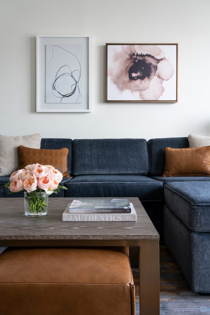 Natural oak, plush upholstery and artwork contribute to the new look in guest rooms at the Four Seasons Hotel in downtown Houston. (Photo by Four Seasons Hotel Houston)