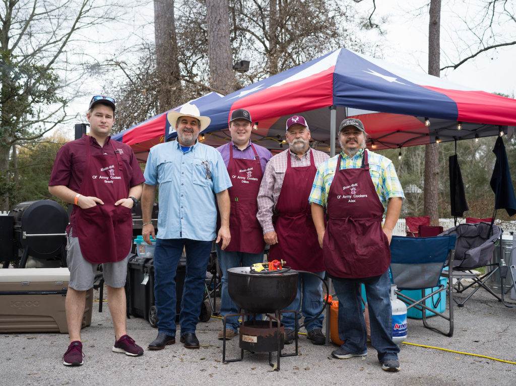 Ole' Army Cookers fire up the grill at The Houstonian's inaugural BBQ on the Bayou Cook-off.
