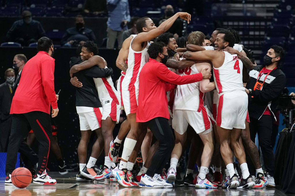 When you make the Final Four, a pile of happy hugs is the only way to go. (Photo by Jack Dempsey/NCAA Photos via Getty Images)