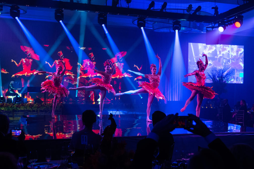 Elan Artists, tapped by Richard Flowers and The Events Company, light up the night at the Houston Symphony Ball.  (Photo by Wilson Parish)