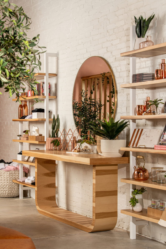 Uncommon James' home collection features accents pillows, soy wax candles, and copper kitchenware. 