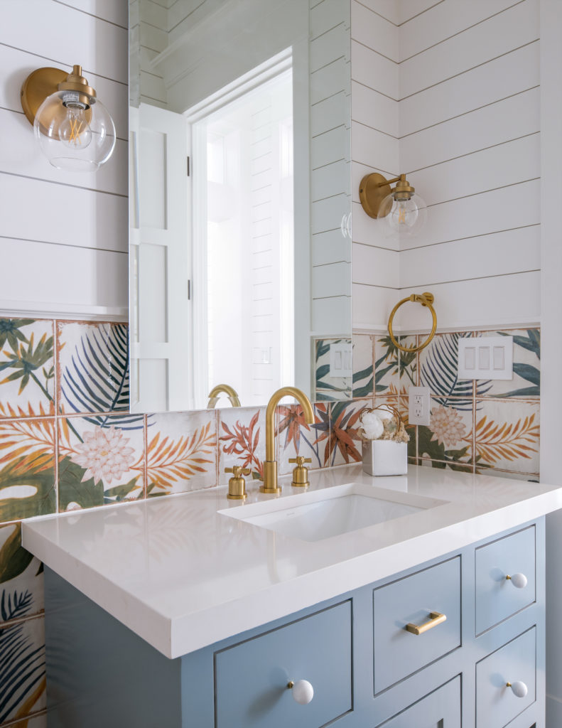 Whimsical tile work transforms one of several bathrooms. (Photo courtesy of Compass Real Estate)