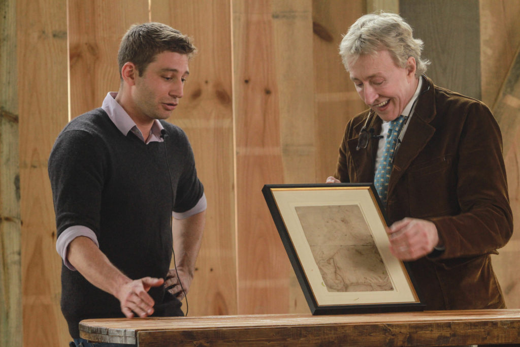 Leigh Keno examines a rare Renaissance drawing by Michelangelo's teacher, Domenico Ghirlandaio, owned by Ruby Lane's Alex Gardner. (Photo by Chris P. Bachman)