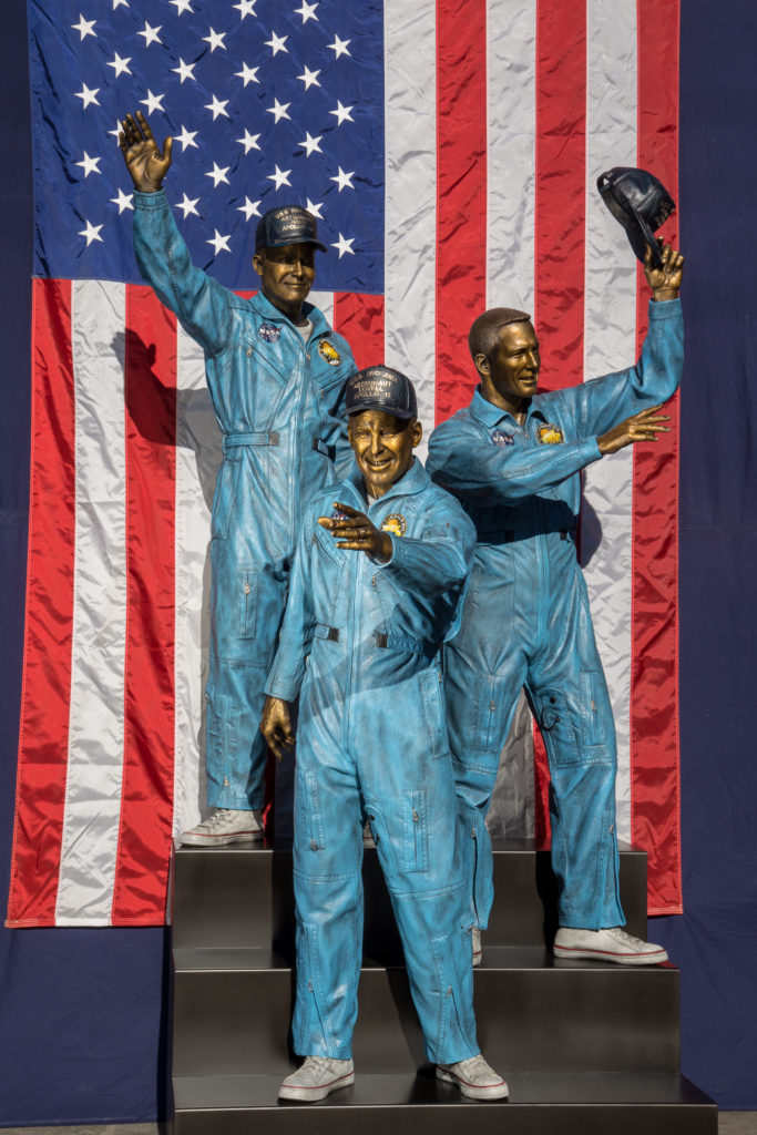 Life-size bronze sculptures of astronauts James Lovell, Fred Haise, and the late Jack Swigert of the Apollo 13 mission at NASA Johnson Space Center. (Photo by Warwick Adventures)