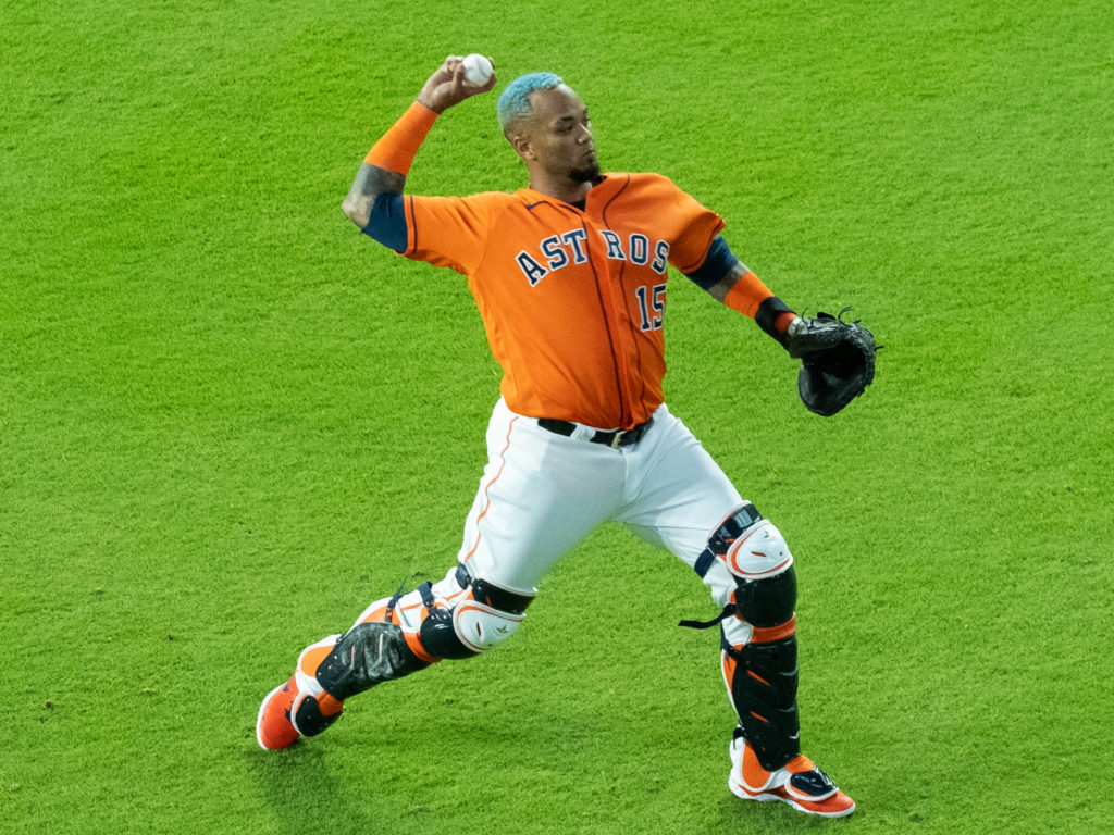 Houston Astros catcher Martin Maldonado makes a statement with his defense — and his blue hair. (Photo by F. Carter Smith)