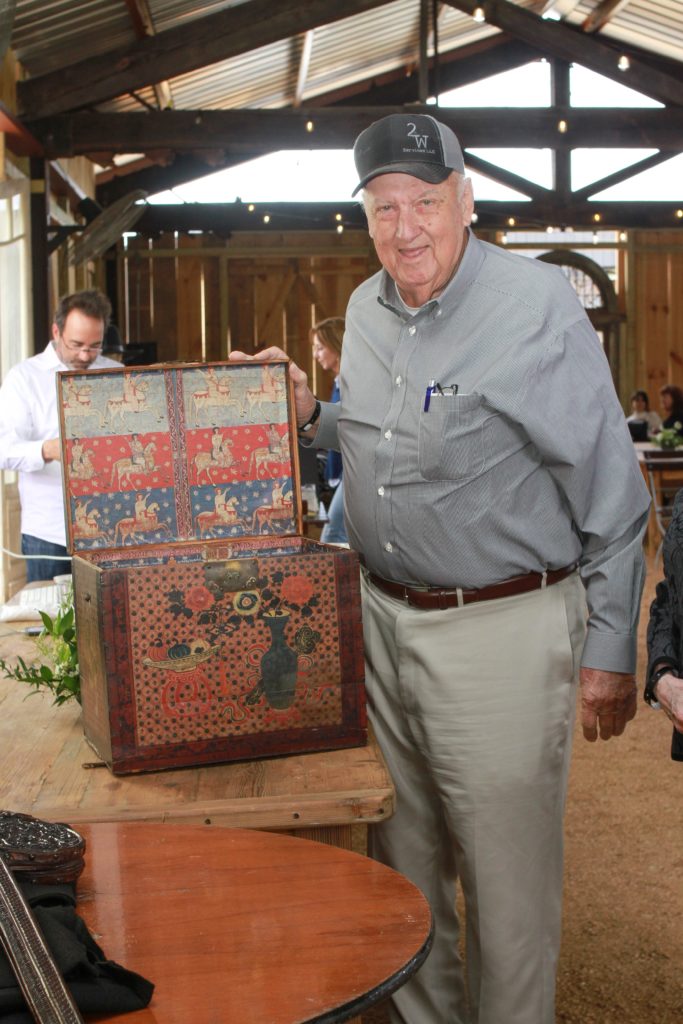 Henry Churchwell with a Chinese tea box. (Photo by Chris P. Bachman) 