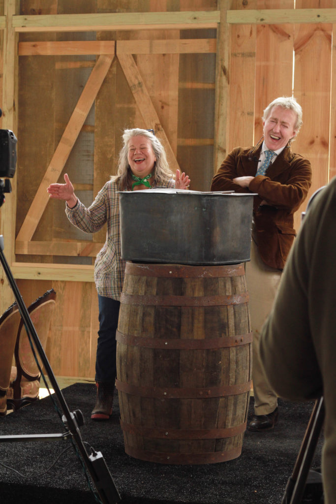 Round Top Publishers' Katie Stavinoha cuts up with Leigh Keno over her Maine object. (Photo by Chris P. Bachman) 