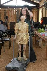 Lauren Monroe wheels her family's 18th-century Italian angel in to meet Leigh Keno. (Photo by Chris P. Bachman)