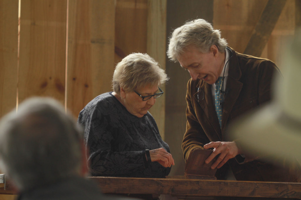 Lynda Churchwell brought a Dante volume for Leigh Keno to decode. (Photo by Chris P. Bachman) 