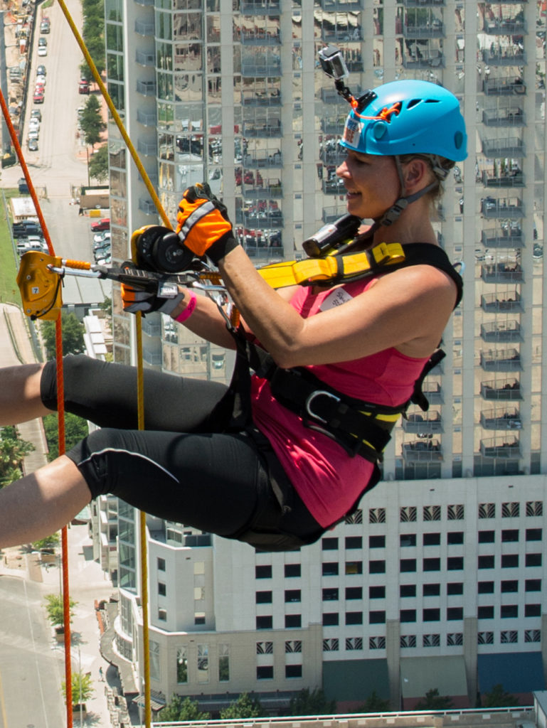 The Women's Home pivots from its annual luncheon to a rappel challenge with Over the Edge guiding participants down the side of a 26-story building. (Over-the-Edge photo)