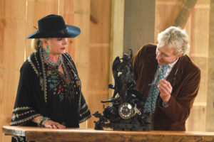 Leigh Keno reveals secrets about Ronna Hardage's figural metal clock. (Photo by Chris P. Bachman)