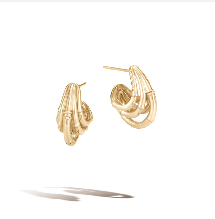 The snap lock earrings in the John Hardy Bamboo Collection are available in either gold or silver.