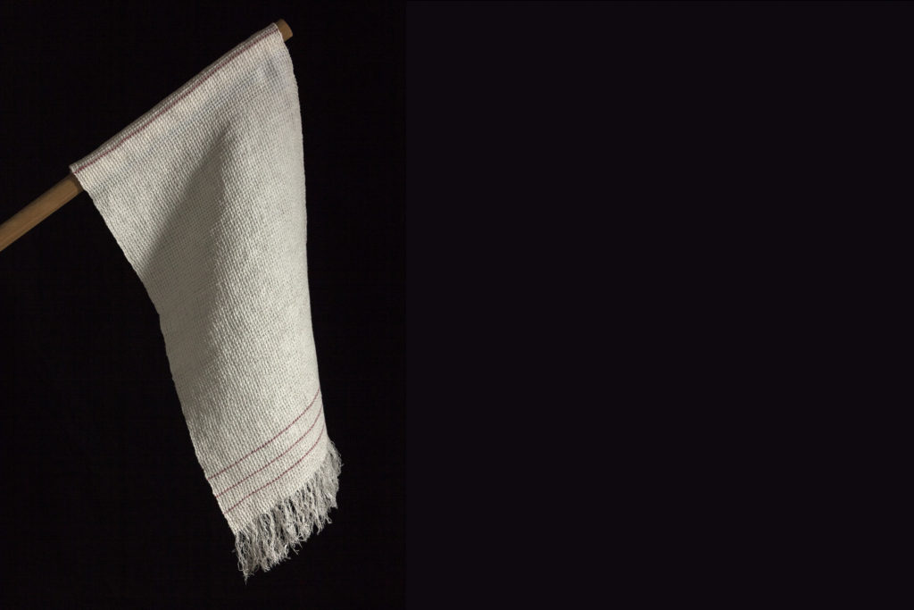 Sonya Clark an American fiber artist of Afro-Carribean heritage uses different material and objects to shed light on personal and cultural stories. In collaboration with the Fabric Workshop and Museum, Philadelphia, Sonya Clark's woven replica of the Confederate Flag of Truce, 2019. (Photo by Carlos Avendaño) 