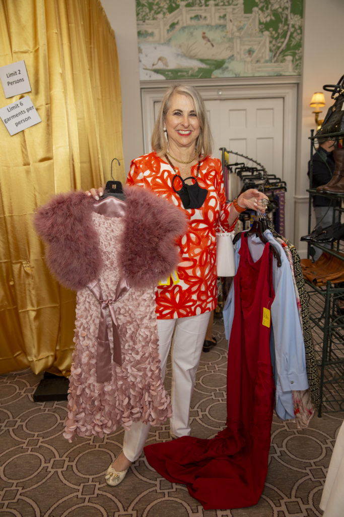 Susan Hansen shops the Chic Boutique at the Salvation Army Reflections on Style luncheon. (Photo by Jenny Antill Clifton)