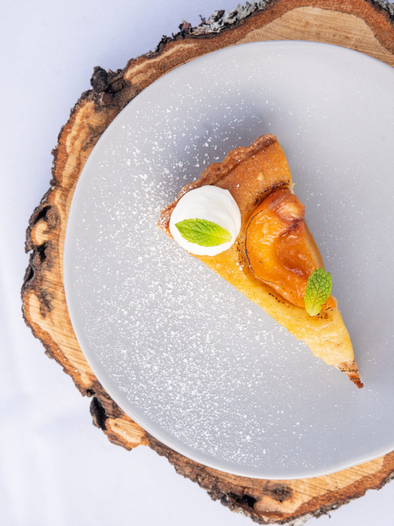 The fifth course: a peach, cream and coriander dessert. (courtesy of Collective Retreats)