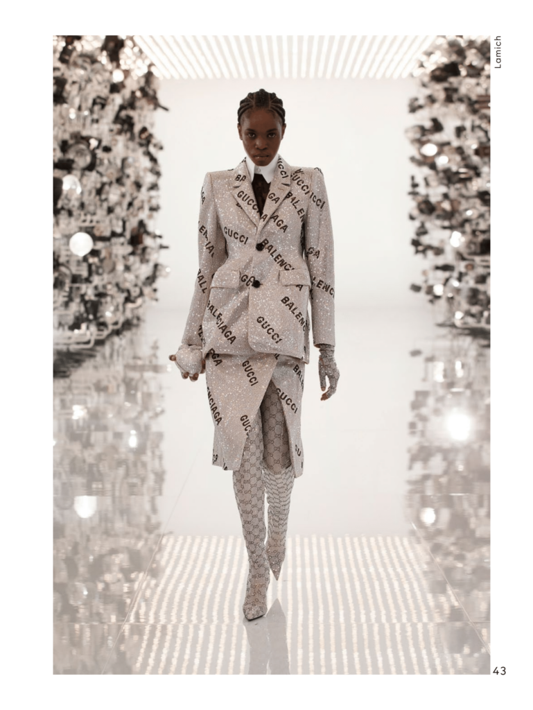 Gucci silver suit emblazoned with Gucci and Balenciaga logos. (Photo courtesy of Gucci)