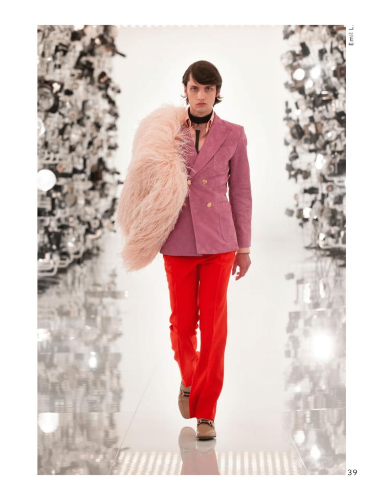Gucci mauve double-breasted blazer, red pants, feather stole. (Photo courtesy of Gucci)