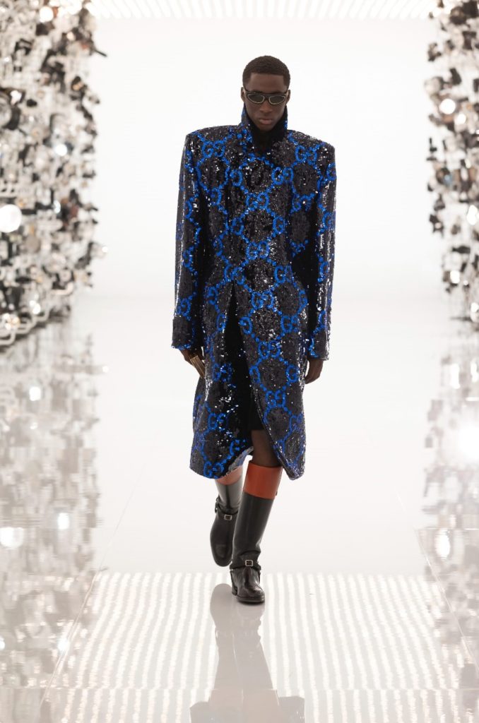 The new Gucci Aria collection features a sparkly sequined coat with the iconic Gucci logo. (Photo courtesy of Gucci)