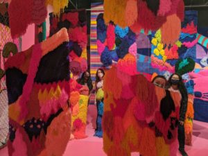 We highly recommend the “Intangible, A Fiber Fairytale” exhibit that will make you feel like a kid again. Left to right: Estefany Sanchez, Elizabeth Moeller, Rachel Birdwell, Milca Sanchez. (Photo by Crystal Correa)