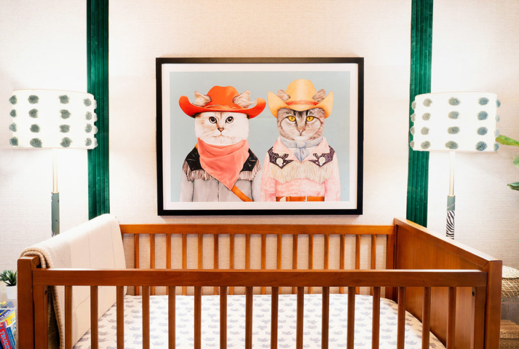 Brandon Maxwell created  a budget-friendly nursery for his sister in Austin with framed vintage rodeo posters from Etsy, padded wall with fabrics from Jo-Ann's, and lamps with pompon shades from Anthropologie. (Photo by Jessy Price for Brandon Maxwell)