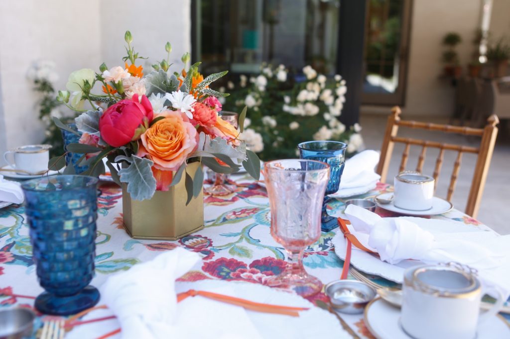 Tea cups sit poised, ready to be cheered with. (Photo by Liz Junell)