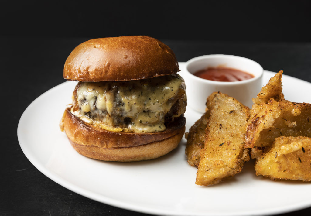 The French Onion Soup is a great example of proper technique and execution. Perfectly caramelized onions and proper veal stock—both of which take time and attention to detail—are what set our soup apart from others.” 

The burger is made with 44 Farms ground chuck, caramelized onions, gruyere and horseradish dijonnaise and served with housemade steak fries. 