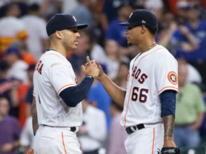 Bryan Abreu (No. 66) got the first save of his young career. But not until Carlos Correa calmed him down twice. (Photo by F. Carter Smith)