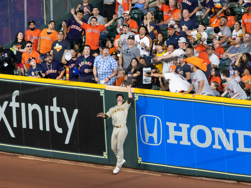 Will Meyers waited a few beats after he caught Chas McCormick's grand slam bid at the wall. (Photo by F. Carter Smith)