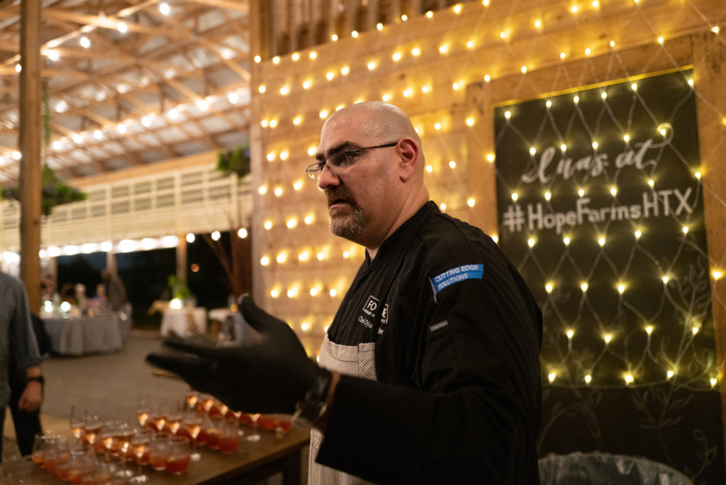 Sysco's Chef Ojan Bagher at The Gathering Barn at Hope Farms where Recipe For Success hosted the Delicious Alchemy dinner. (Photo by Daniel Ortiz)