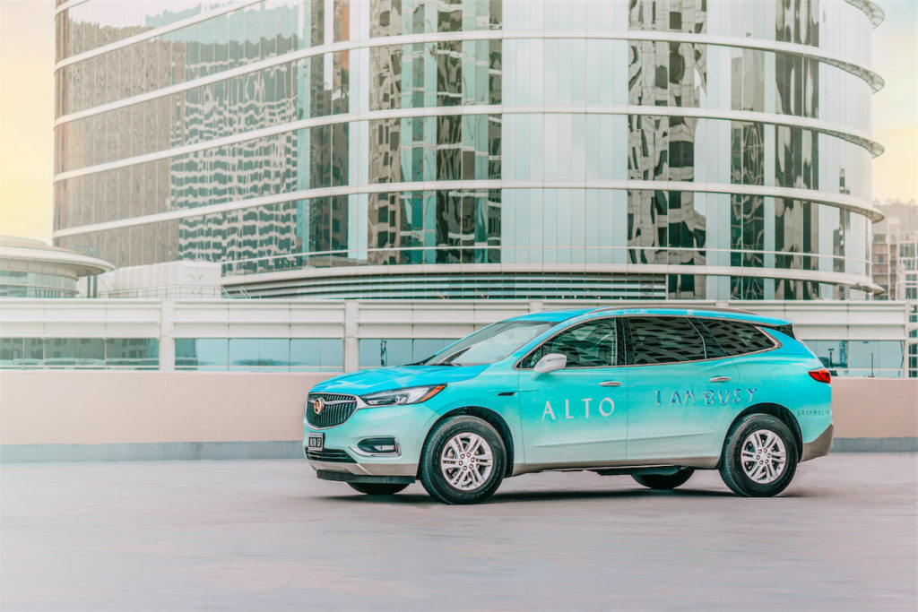 Malin's Houston art car features his best-selling print "I Am Busy."