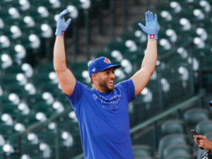 Outfielder George Springer visits with his former Astros teammates and coaches before his new team, the Toronto Blue Jays, began a series at Minute Maid Park. Springer is currently on the injured list and won’t be in uniform to play against his first te