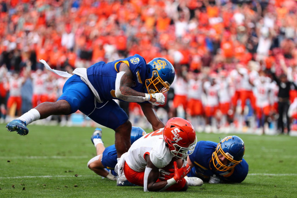 Sam Houston's Ife Adeyi caught the game winning touchdown between two South Dakota State defenders in the final minute. (Photo by C. Morgan Engel/NCAA Photos via Getty Images)