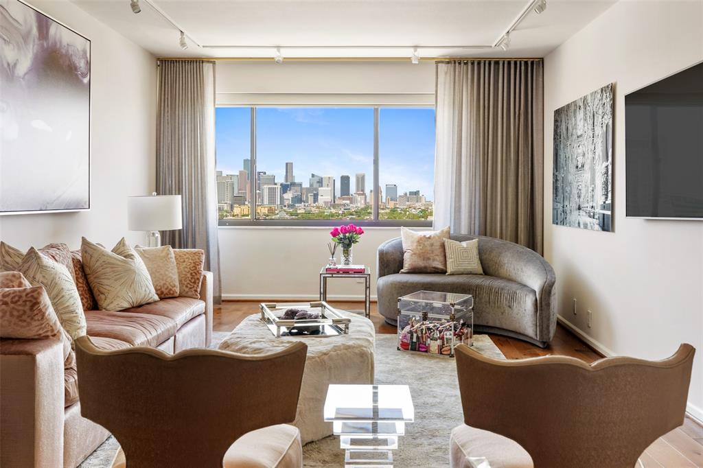 The downtown Houston skyline view from the 16th floor condo at 1400 Hermann is a positive selling point.