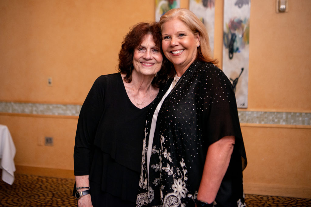 Donna Vallone, Linda Rhodes at Tony's restaurant for a dinner benefiting The Women's Fund for Health Education and Resiliency. (Photo by Michelle Watson CatchlightGroup.com)